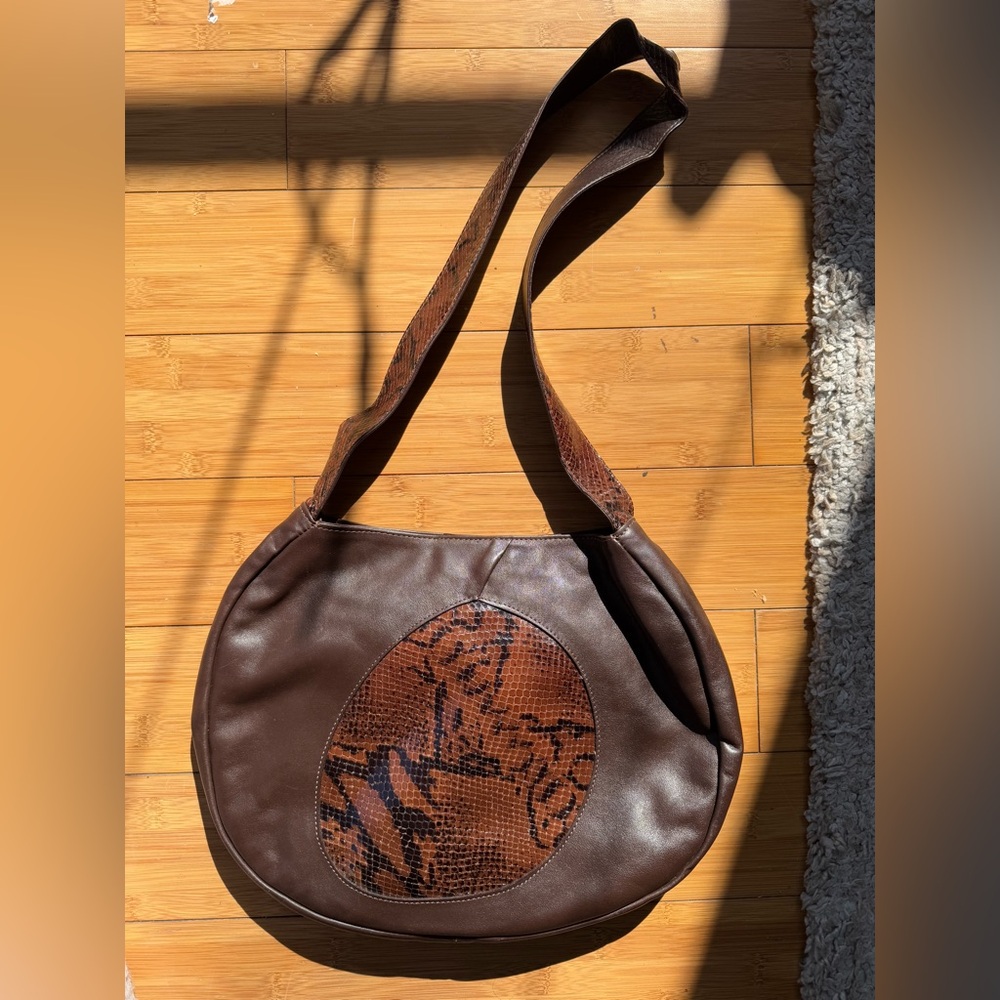“i Santi” vintage leather purse